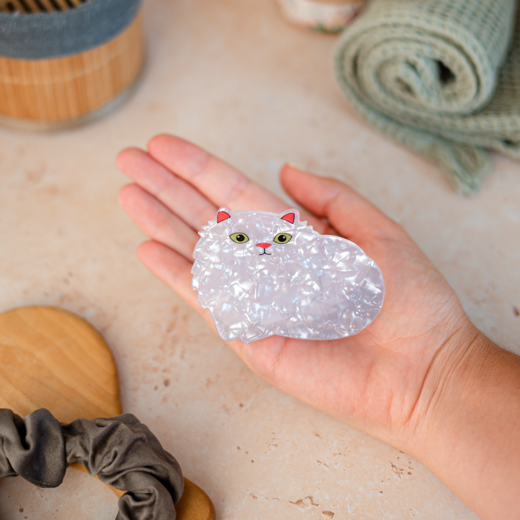 White cat hair clip